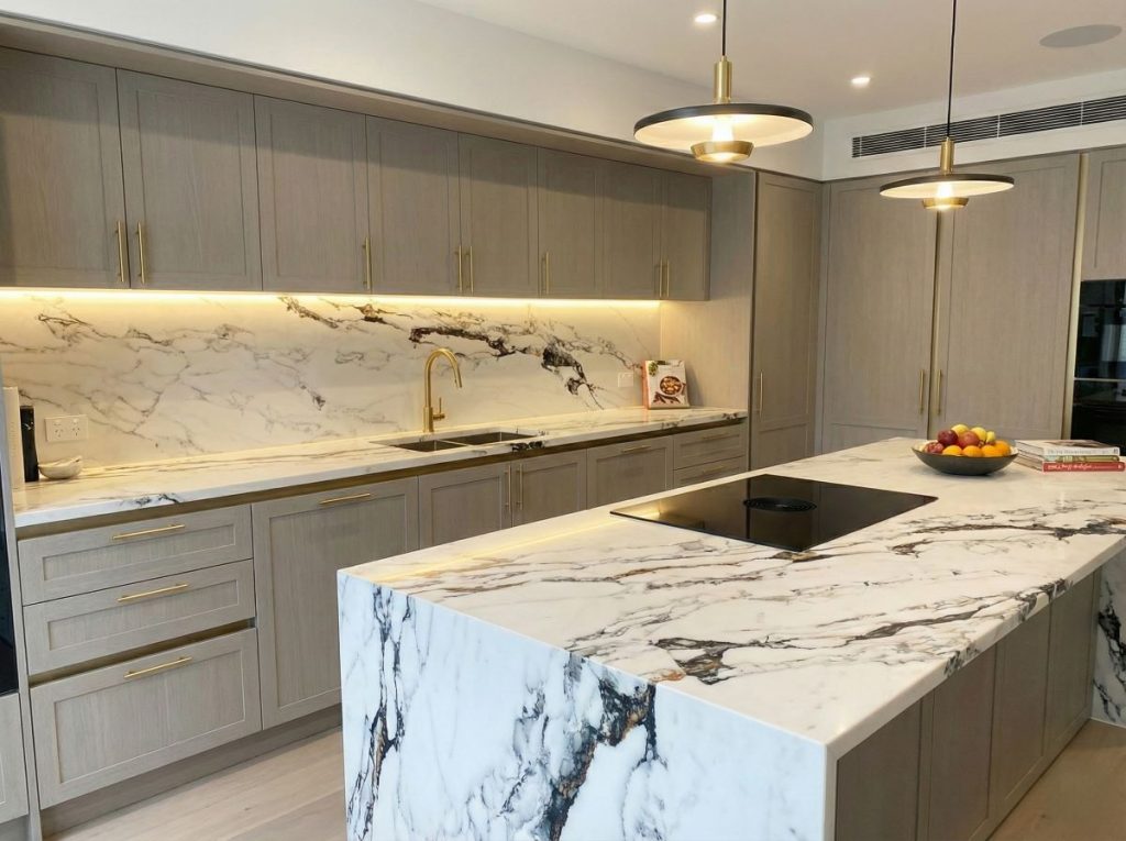 Calacatta Splendid countertops and shaker kitchen cabinets