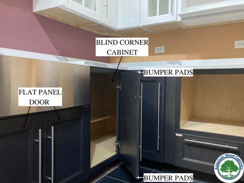Blind corner kitchen cabinets with flat panel doors and bumper pads